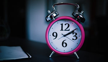 9 Ways to Fall Sleep Faster - Turn around the alarm clock